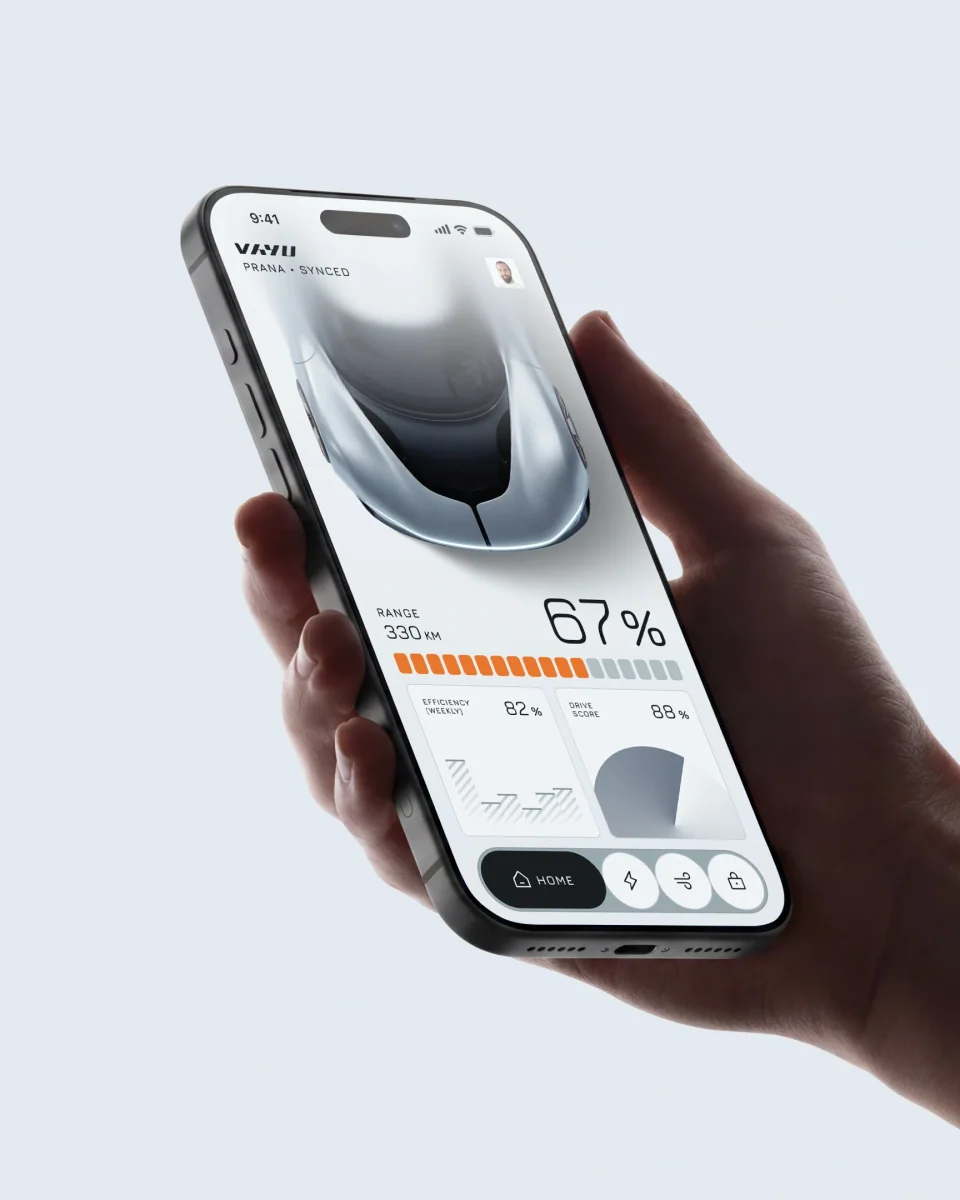 Hand holding a phone showing the Vayu app with the car at 67 percent charge